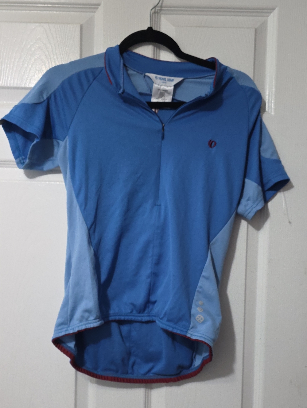 Pearl Izumi Light Blue Cycling Jersey with Red Logo